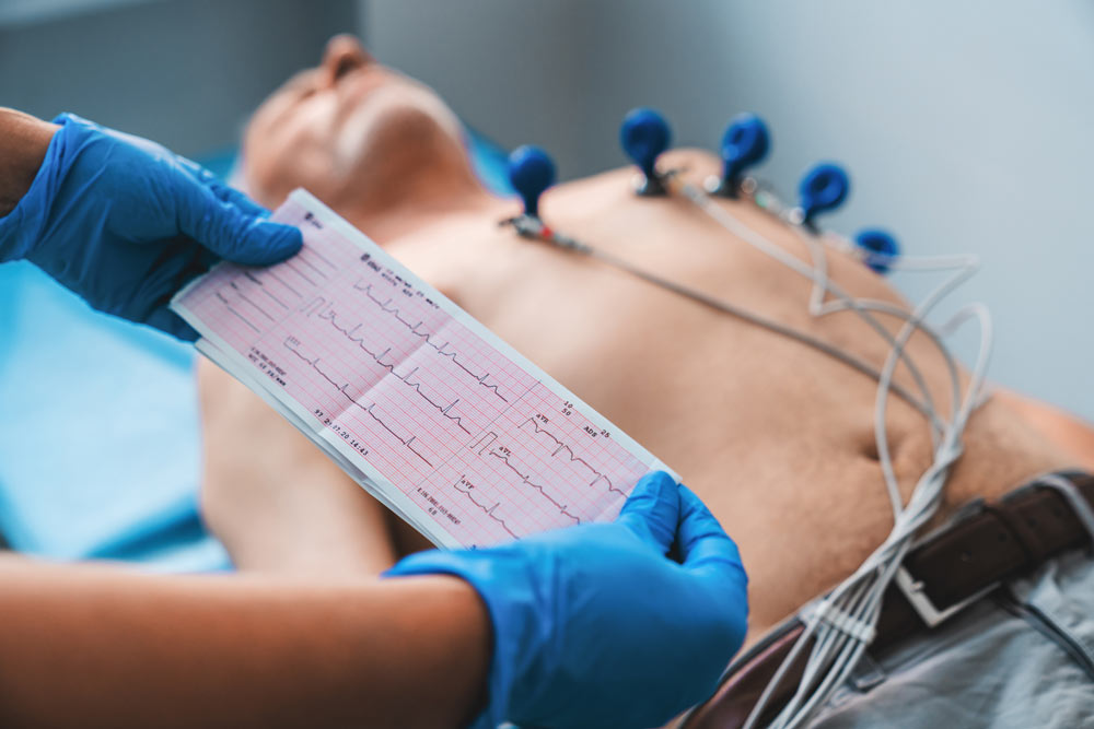 EKG cardiac screening being performed on patient